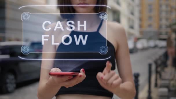Jonge volwassene interageert hologram Cash Flow — Stockvideo