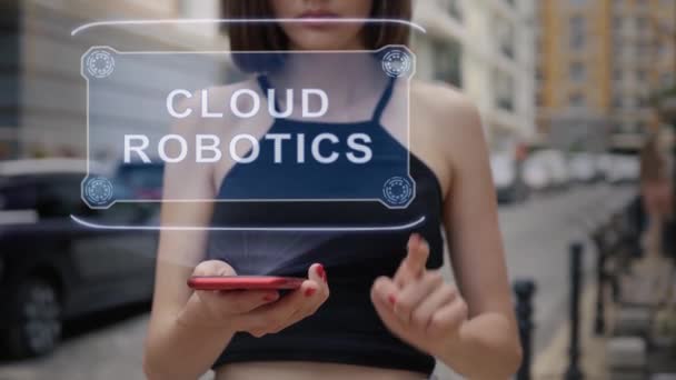 Young adult interacts hologram Cloud Robotics — стоковое видео