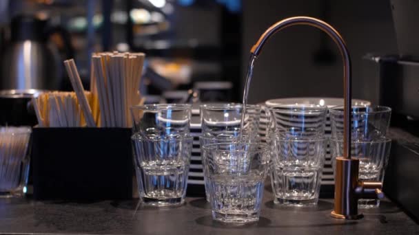 Slow Motion Clear Fresh Drinking Water Filling Glass Cafe Blurred — Wideo stockowe