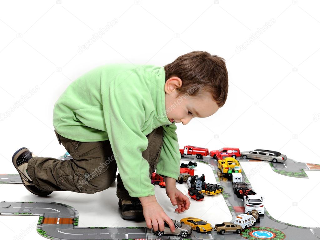 Young Boy Playing With Toy