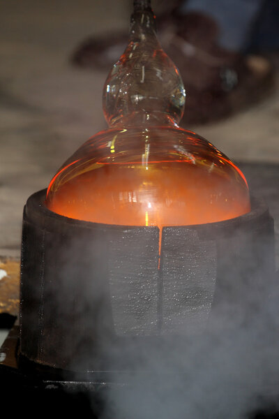 Glass factory, glassworks, glass blower