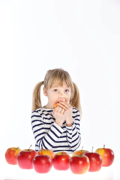 Girl with apples on a white background — Stock Photo, Image