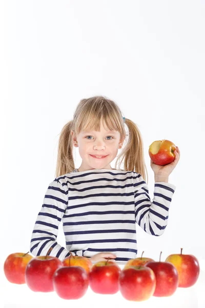 Girl with apples on a white background — Stock Photo, Image