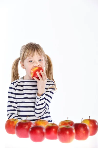 Girl with apples on a white background — Stock Photo, Image