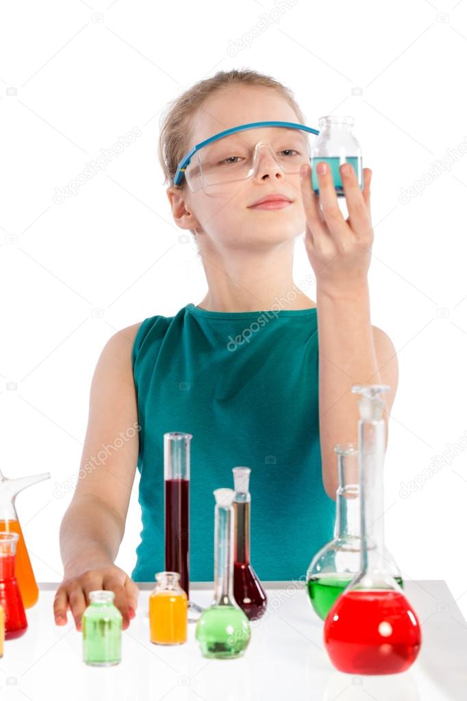 Teenager in chemistry class, chemistry lesson
