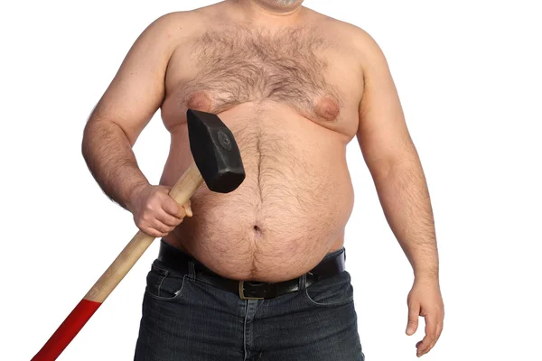 Strong fat man holding a big hammer — Stock Photo, Image