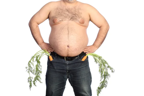 Fat man holding carrot — Stock Photo, Image