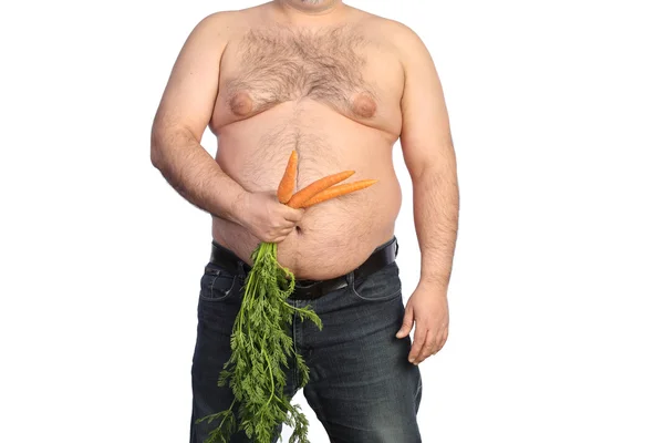 Grasso uomo in possesso di carota — Foto Stock