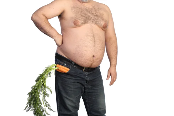 Fat man holding carrot — Stock Photo, Image