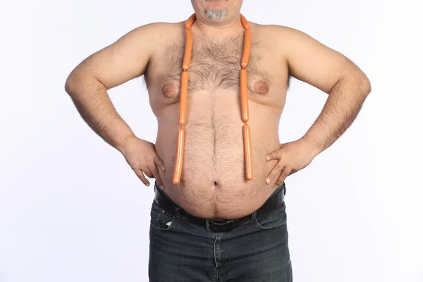 Hombre gordo y salchichas — Foto de Stock