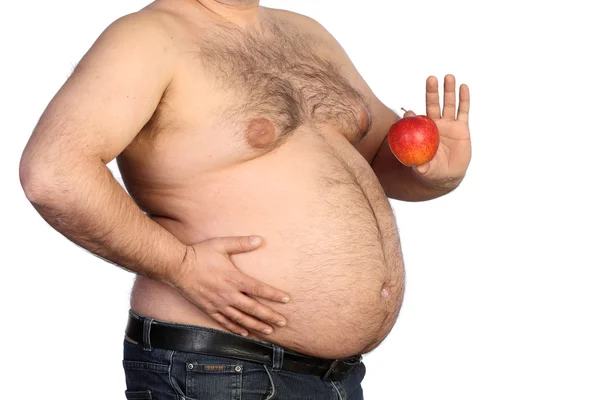 Толстяк держит яблоко — стоковое фото