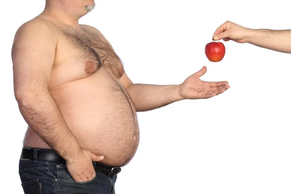 Hombre gordo sosteniendo manzana — Foto de Stock