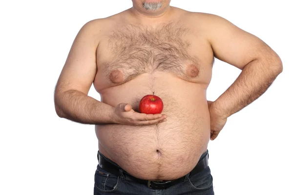 Gordo segurando maçã — Fotografia de Stock