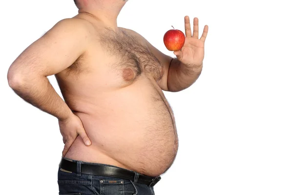 Толстяк держит яблоко — стоковое фото
