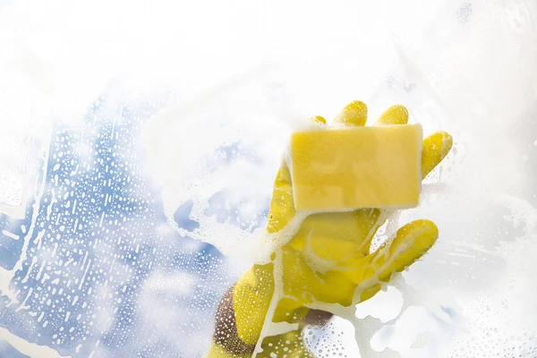 Window cleaner with sponge cleaning glass window, Cleaning conept image — Stock Photo, Image
