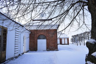 historic brick house in winter