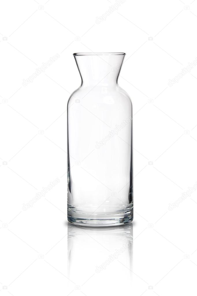 Tall transparent glass jug on white background