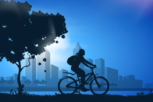 Silhouette eines Mädchens auf dem Fahrrad — Stockfoto