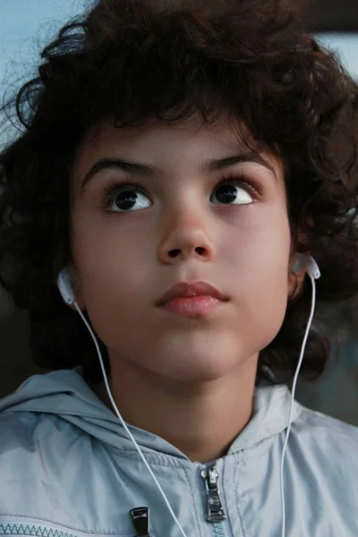 Παιδί με ακουστικό Royalty Free Εικόνες Αρχείου