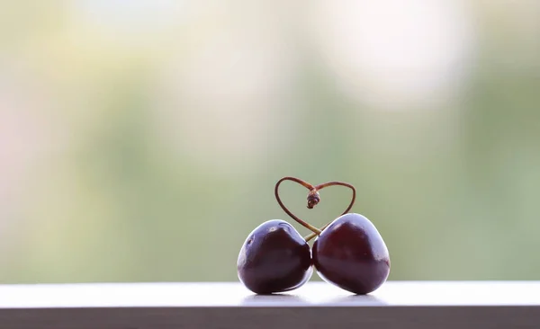 Concept Pair Cherries Hanging Clothespin Water Splashed — Stock Photo, Image