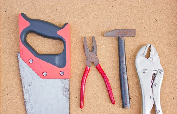 Set of tools over cork board. — Stock Photo, Image