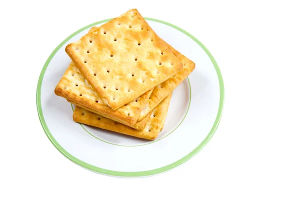 Stapel van crackers op plaat. — Stockfoto