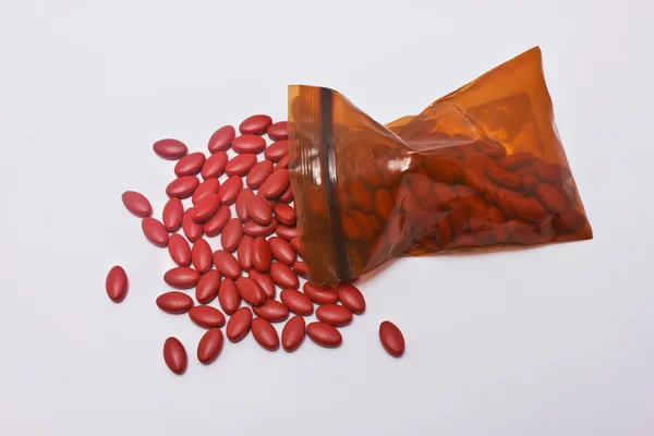 Rode aanvulling tabletten. — Stockfoto