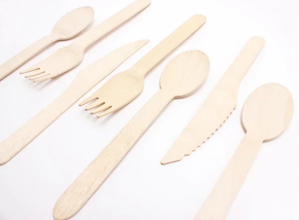 Fila de cuchillos, tenedores y cucharas perspectiva vista aislada en whi — Foto de Stock