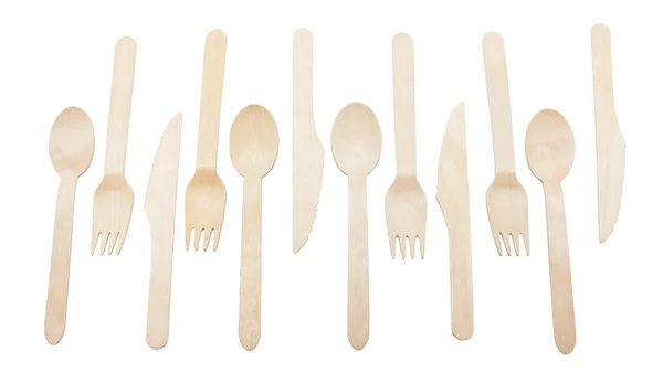 Filas de tenedores y cucharas aisladas sobre fondo blanco . — Foto de Stock