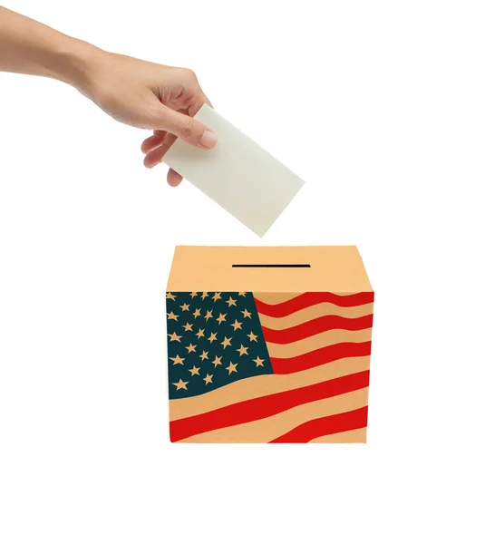 Hand putting a voting bollot into the box isolated on white back — Stock Photo, Image