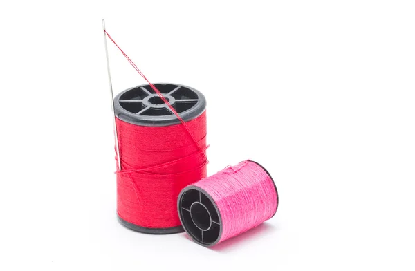 Spool of thread and needle isolated on white background. — Stock Photo, Image