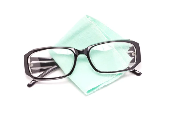 Eye glasses with cleaning cloth isolated on white background. — Stock Photo, Image