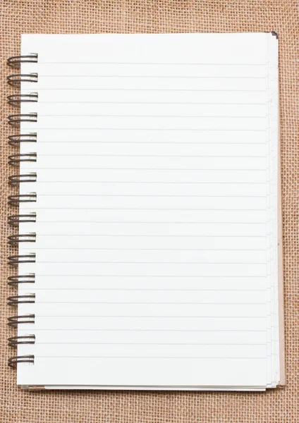 Cuaderno encuadernador sobre fondo saco . —  Fotos de Stock