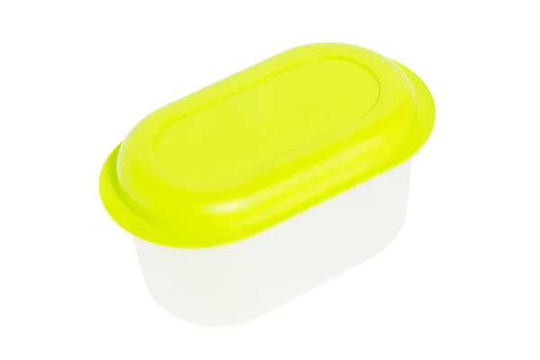 Lege voedsel plastic container met groene deksel geïsoleerd op wit. — Stockfoto