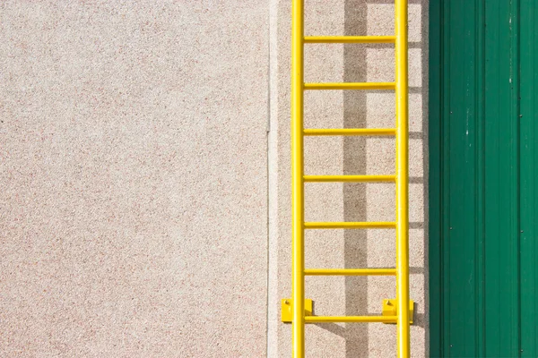 Yellow ladder with space for text. — Stock Photo, Image