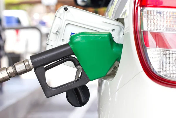 Car With A Gas Pump. Royalty Free Stock Photos