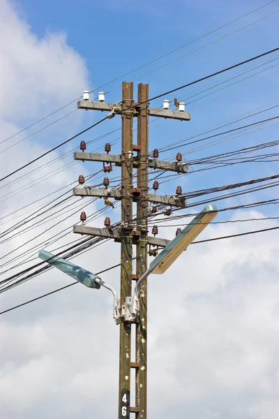 Electric post in front of the sky. — Stock Photo, Image