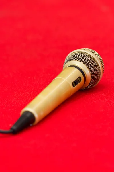 Golden Microphone on Red Background. — Stock Photo, Image