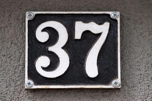 House number on a wall — Stock Photo, Image