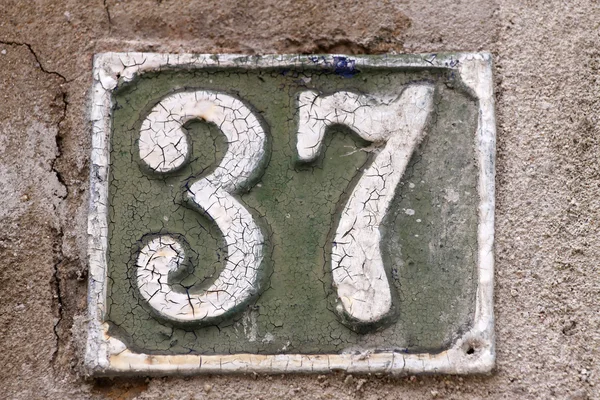 House number on a wall — Stock Photo, Image