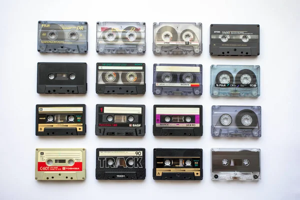 Sofia, Bulgaria - August 12, 2022: Collection of old audio cassette tapes isolated on white background, vintage music and technology concept.