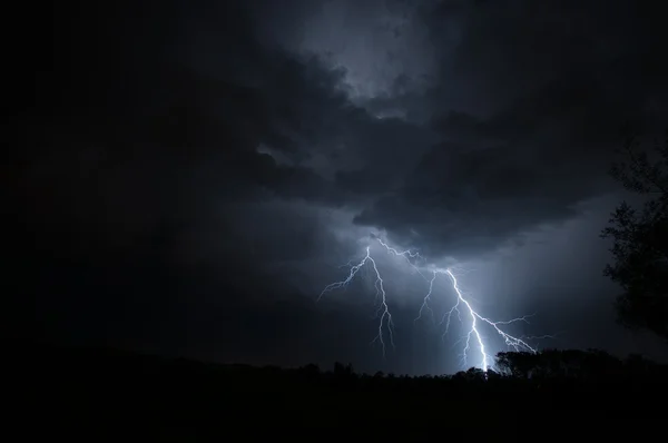 Lightning strike reaching the ground Royalty Free Stock Images
