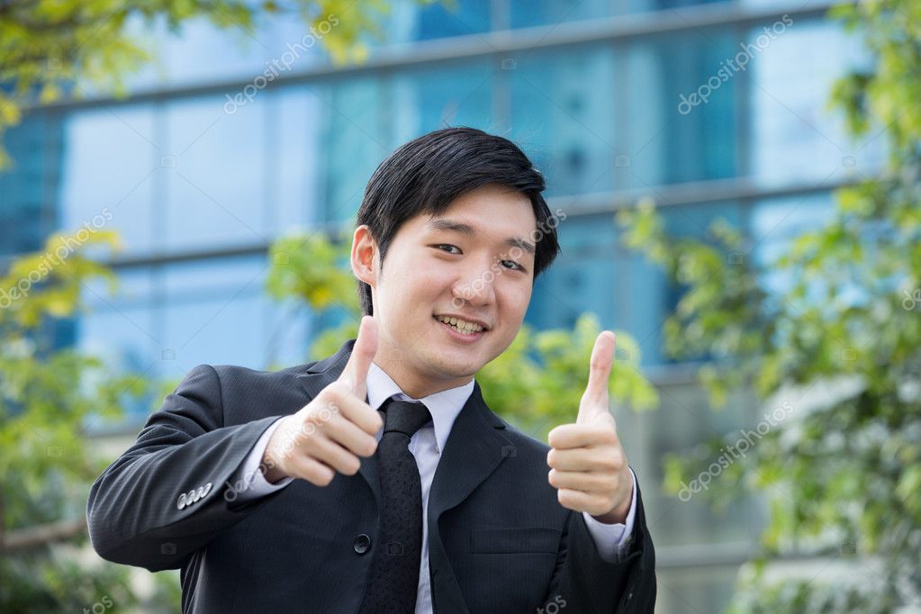 Chinese man with thumbs up