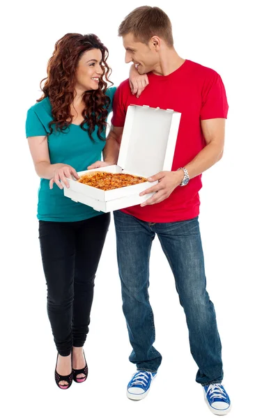 Love couple sharing pizza. Enjoying together — Stock Photo, Image