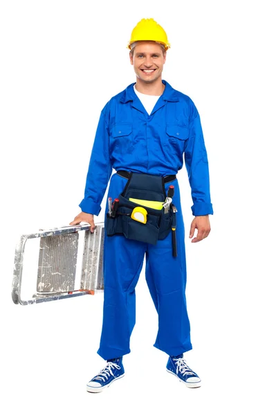 Construction worker ready with stepladder — Stock Photo, Image