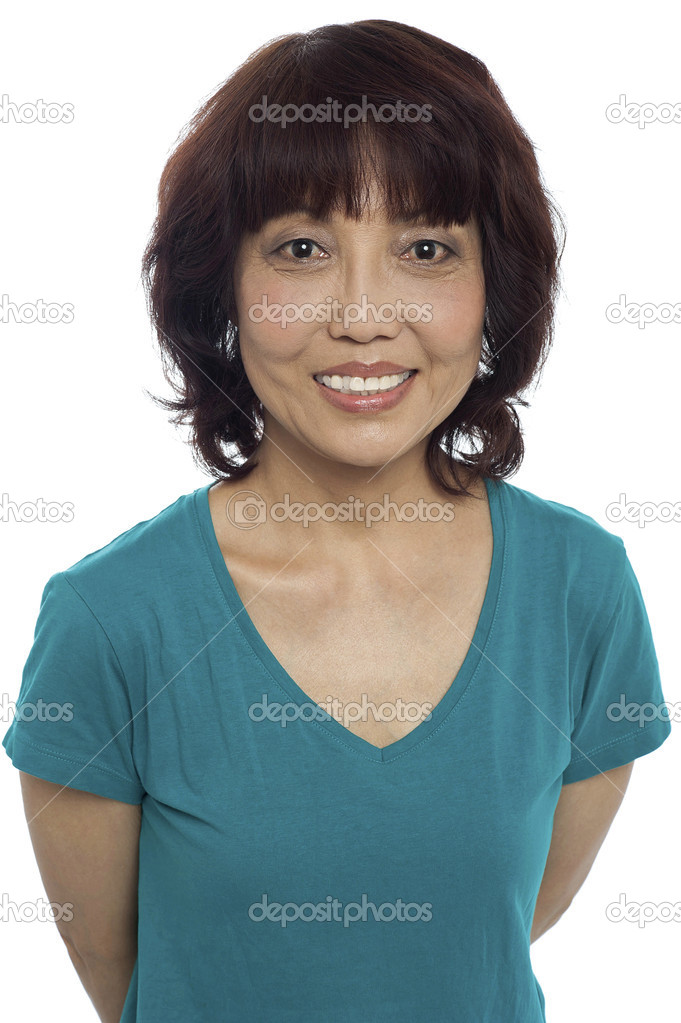 Picture of a smiling asian lady posing casually