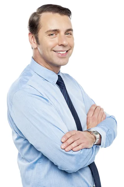 Handsome representative posing with folded arms — Stock Photo, Image