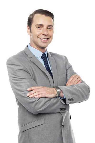 Male consultant smiling with his arms crossed — Stock Photo, Image