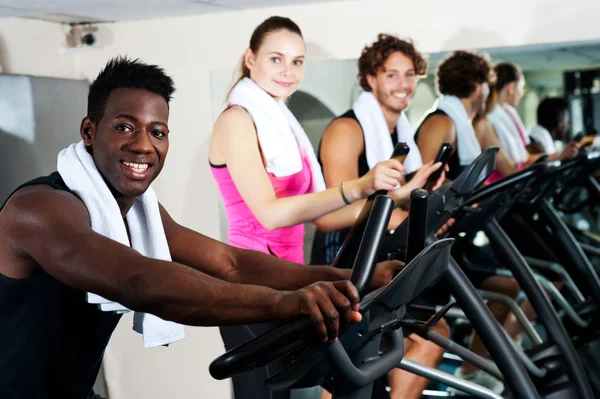 Energetic group working out together Stock Photo