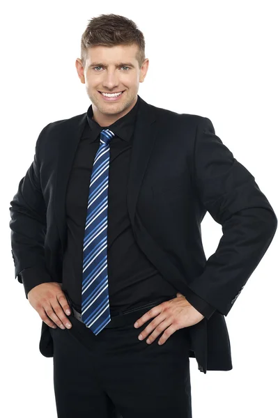 Confident young businessman posing casually — Stock Photo, Image